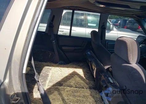 1997 Jeep Grand Cherokee Laredo/Tsi из США, поврежденный, VIN 1J4FX58S1VC514156